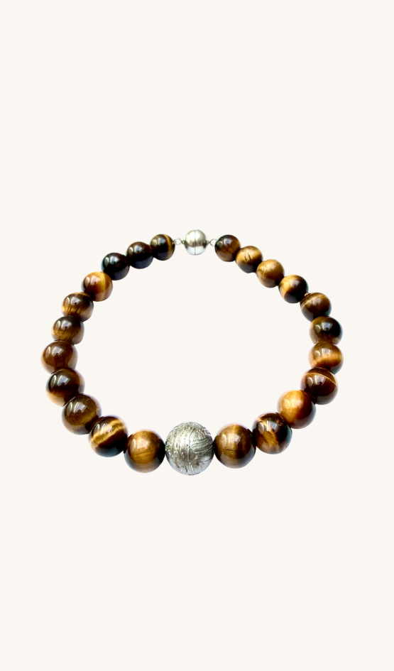 Tiger Eye & Gibeon bracelet detail — the Gibeon meteorite sphere and 925 sterling silver magnetic clasp